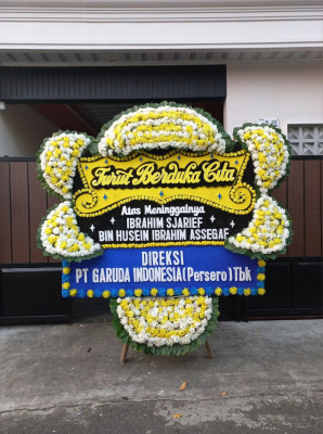 Papan Bunga Duka di Buha